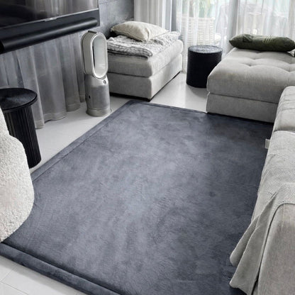 Dark grey memory foam carpet in a Dubai room