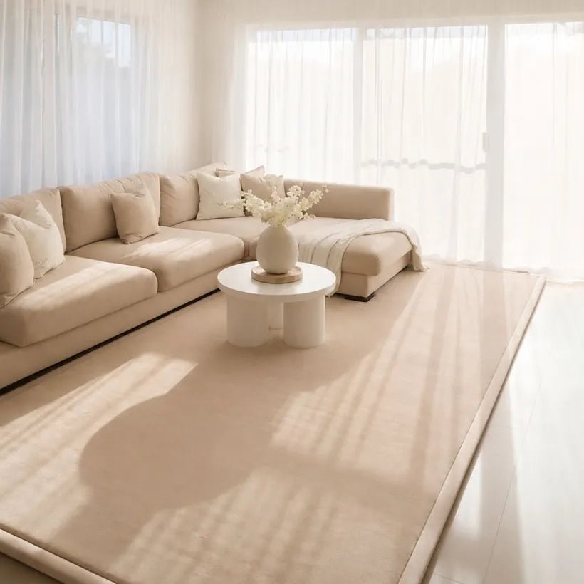 Beige Misk Mat in a modern luxurious living room space with nice couches.